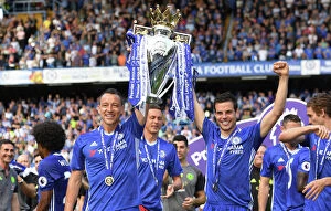 Images Dated 21st May 2017: Chelsea FC: John Terry and Cesar Azpilicueta Lift the Premier League Trophy after Chelsea vs