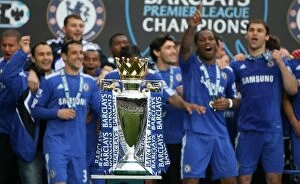 Images Dated 9th May 2010: Chelsea FC: Triumphant Moment with the Premier League Trophy at Stamford Bridge (2009-2010)