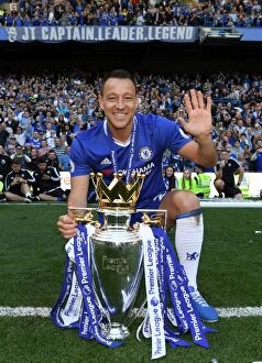 Images Dated 21st May 2017: Chelsea Football Club: John Terry Lifts the Premier League Trophy at Stamford Bridge (2017)
