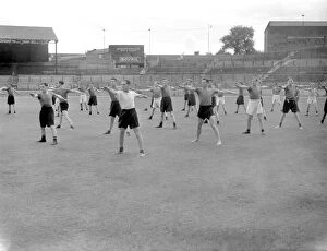 Training Pictures Collection: Chelsea Football Club: Players Warming Up for Training at Stamford Bridge