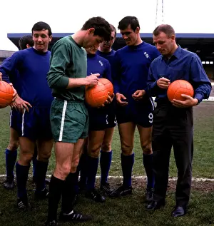 Chelsea Footballers and Manager Sign Footballs Ahead of FA Cup Final: John Boyle, Peter Bonetti, Tony Hateley, and Tommy Docherty