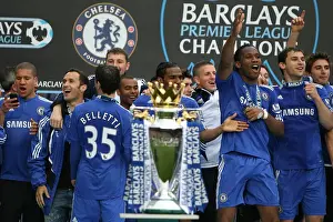 Chelsea players celebrate after winning the Premier League title at Stamford Bridge