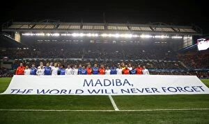 Images Dated 11th December 2013: Chelsea and Steaua Bucharest Honor Nelson Mandela: A United Tribute Before the UEFA Champions