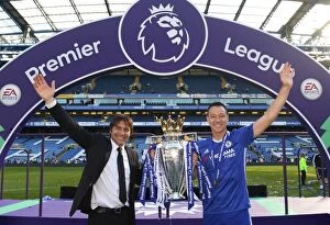 Images Dated 21st May 2017: Chelsea's Antonio Conte and John Terry Lift the Premier League Trophy After Chelsea v Sunderland