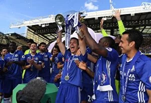 Images Dated 21st May 2017: Chelsea's Cesar Azpilicueta Lifts the Premier League Trophy at Stamford Bridge