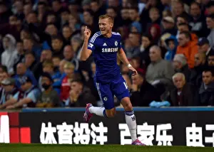 Chelsea's Double Triumph: Schurrle's Brace at Burnley's Turf Moor (BPL 2014 Opening Match)