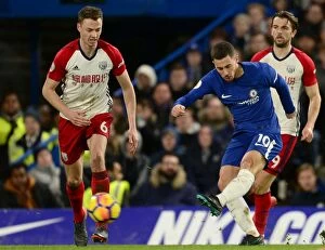 Club Soccer Collection: Chelsea's Eden Hazard Scores Third Goal Against West Bromwich Albion in Premier League Match