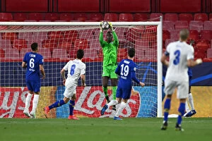 Club Soccer Collection: Chelsea's Edouard Mendy Makes Saving in Empty Estadio Ramon Sanchez Pizjuan during UEFA Champions