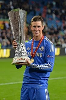 Chelsea v Benfica 16th May 2013 Europa Cup Final Collection: Chelsea's Europa League Triumph: Fernando Torres Lifts the Trophy at Amsterdam Arena (May 16, 2013)
