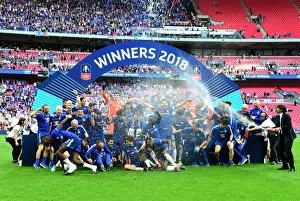 Chelsea's FA Cup Triumph: Conte and His Champions Celebrate with Champagne