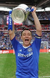 Images Dated 15th May 2010: Chelsea's Glory: John Terry Lifts the FA Cup at Wembley Stadium (2010)