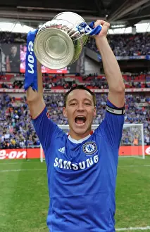Chelsea's Glory: John Terry Lifts the FA Cup at Wembley Stadium (2010)