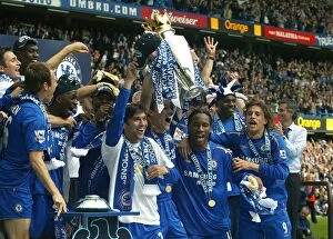 Premier League Winners 2005-2006 Collection: Chelsea's Glory: John Terry Lifts the Premier League Trophy (2005-2006)