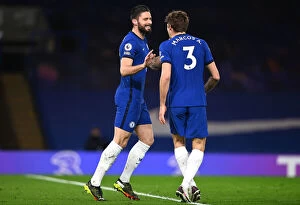 Club Soccer Collection: Chelsea's Olivier Giroud and Marcos Alonso Celebrate First Goal Against Newcastle United in Empty