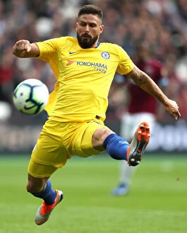 West Ham Away Collection: Chelsea's Olivier Giroud Reaches for the Ball in Intense West Ham Clash