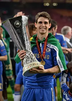 Chelsea's Oscar Lifts the Europa League Trophy: Chelsea FC Victory over Benfica (Amsterdam Arena, May 16, 2013)
