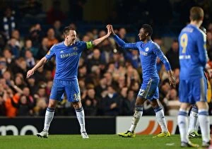 Chelsea v Steaua Bucharest 14th March 2013 Collection: Chelsea's Terry and Mikel Celebrate Second Goal in Europa League Victory over Steaua Bucharest