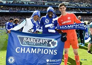 Champions!! Collection: Chelsea's Title Triumph: Loic Remy, Kurt Zouma, and Thibaut Courtois Celebrate Their Premier