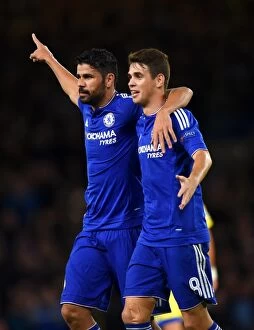 Images Dated 16th September 2015: Chelsea's Triumphant Moment: Costa and Oscar Celebrate Goal in UEFA Champions League Victory