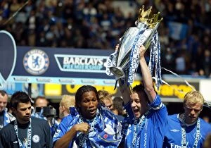 Premier League Winners 2004-2005 Collection: Chelsea's Unforgettable Triumph: John Terry and the Premier League Trophy (2004-2005)
