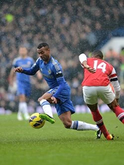 Images Dated 20th January 2013: Clash at Stamford Bridge: Cole vs. Walcott - Premier League Showdown (Chelsea vs)
