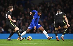 Images Dated 26th December 2017: Clash of the Titans: Batshuayi vs Stephens & Duffy at Stamford Bridge