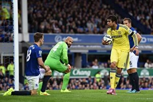 Everton v Chelsea 30th August 2014 Collection: Costa's Taunt: Chelsea's Triumph over Everton - Diego Mocks Coleman for Own Goal (August 30, 2014)
