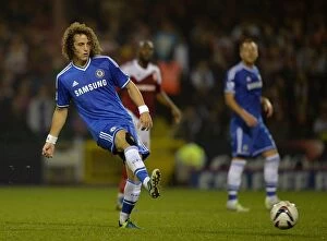 Swindon v Chelsea 24th September 2013 Collection: David Luiz in Action: Chelsea's Thrilling Pass at Swindon Town's County Ground during Capital One