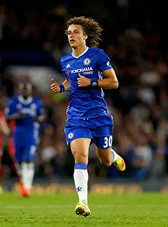 David Luiz Soaring High: Chelsea's Victory Against Liverpool at Stamford Bridge - Premier League