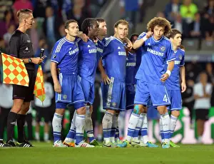 Chelsea V Bayern Munich UEFA Super Cup Prints: David Luiz's Decisive Moment: Chelsea's Penalty Showdown Victory over Bayern Munich in UEFA Super Cup