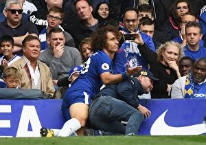 Images Dated 17th September 2017: David Luiz's Unusual Opponent: Fan Collision at Stamford Bridge During Chelsea vs Arsenal Match