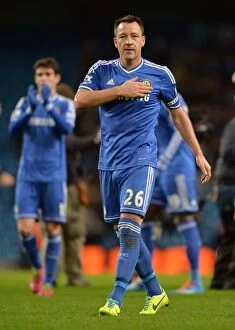 Manchester City v Chelsea 3rd February 2014 Collection: Defiant John Terry: Chelsea's Captain at the End of a Grueling Manchester City vs