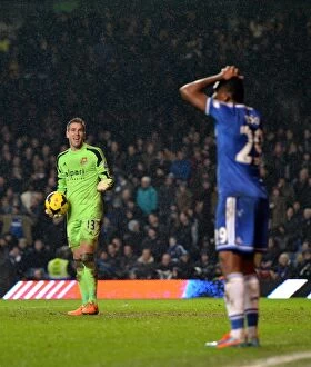 Chelsea v West Ham United 29th January 2014 Collection: Dejected Eto'o and Frustrated Adrian: Goal Disallowed in Chelsea vs