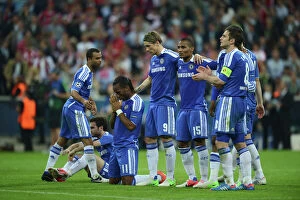 Images Dated 19th May 2012: Didier Drogba in Prayer during Chelsea's UEFA Champions League Final Showdown with FC Bayern