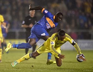 Images Dated 28th October 2014: Didier Drogba vs. Jermaine Grandison: A Fierce Rivalry Unfolds - Chelsea vs