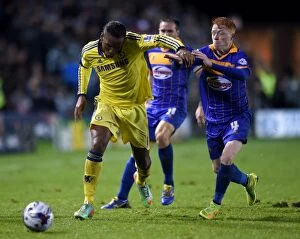 Images Dated 28th October 2014: Didier Drogba's Brush-Off: Chelsea's Unyielding Triumph Over Shrewsbury Town in Capital One Cup