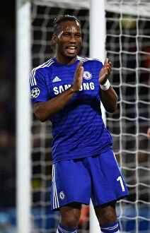 Chelsea v Maribor 21st October 2014 Collection: Didier Drogba's Double: Chelsea's Star Forward Celebrates Second Goal vs