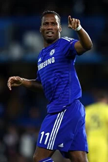 Images Dated 21st October 2014: Didier Drogba's Thrilling Double: Chelsea's Star Forward Celebrates Second Goal vs