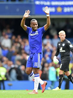 Chelsea v Leicester City 23rd August 2014 Collection: Didier Drogba's Triumphant Moment: Chelsea's Legendary Striker Celebrates Victory Over Leicester