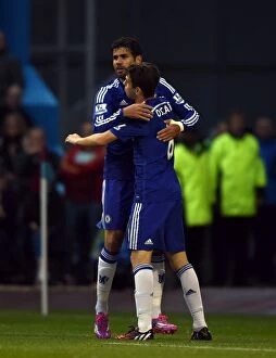 Burnley v Chelsea 18th August 2014 Collection: Diego Costa and Oscar: Celebrating Chelsea's First Goal vs. Burnley (August 18, 2014)