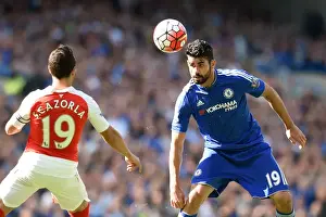 September 2015 Prints: Diego Costa vs Santi Cazorla: A Premier League Rivalry Ignites at Stamford Bridge (September 2015)