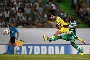 Sporting Lisbon v Chelsea 30th September 2014 Collection: Diego Costa's Determined Shot vs. Mahamadou-Naby Sarr in UEFA Champions League: Sporting Lisbon vs
