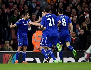 Images Dated 24th January 2016: Diego Costa's Thrilling Goal: Arsenal vs. Chelsea, Premier League Rivalry Ignites at Emirates