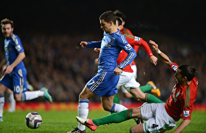 Eden Hazard Dodges Chico's Tackle in Intense League Cup Semi-Final Clash between Chelsea and Swansea (January 9, 2013)