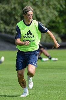 Training Pictures Collection: Fernando Torres in Action: Chelsea Star's Intense Training at Cobham Ground (August 2012)
