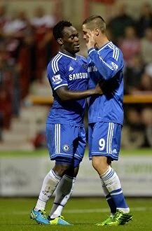 Images Dated 24th September 2013: Fernando Torres and Michael Essien Celebrate First Goal for Chelsea Against Swindon Town in