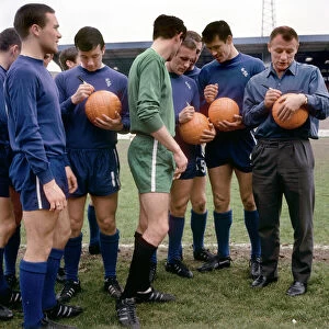 Ron Harris Collection: Footballers of Chelsea's Division One Team Signing Footballs Before FA Cup Final: Ron Harris