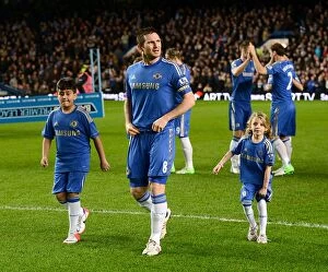 Images Dated 2nd January 2013: Frank Lampard and Chelsea Mascots: Pre-Match Gathering at Stamford Bridge (Chelsea v QPR)