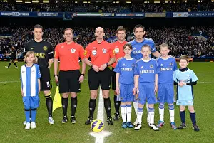Frank Lampard and Gary Caldwell Lead Teams Out at Stamford Bridge: Premier League Clash between Chelsea and Wigan Athletic - Mike Dean Referees with Match Mascots