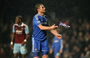 Chelsea v West Ham United 29th January 2014 Collection: Frank Lampard's Passionate Moment: Throwing Boot during Chelsea vs